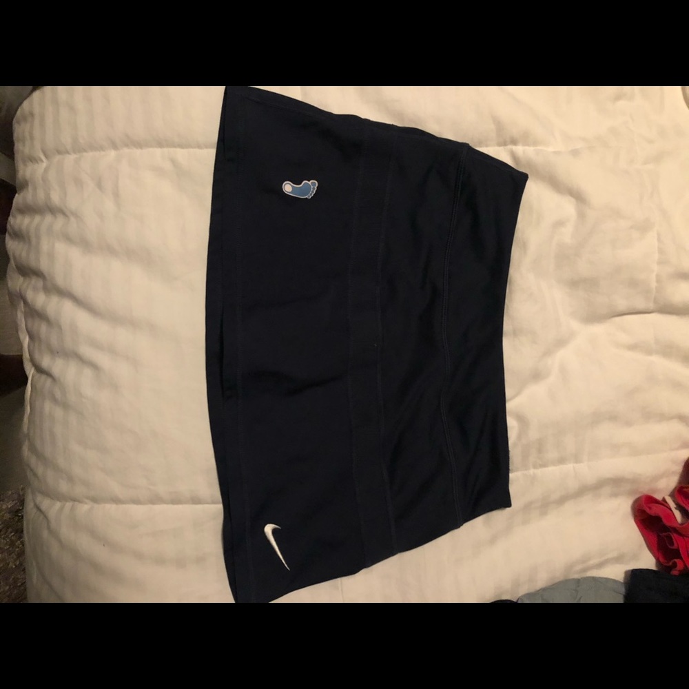 Navy blue Nike tennis skirt with Tar Heel emblem